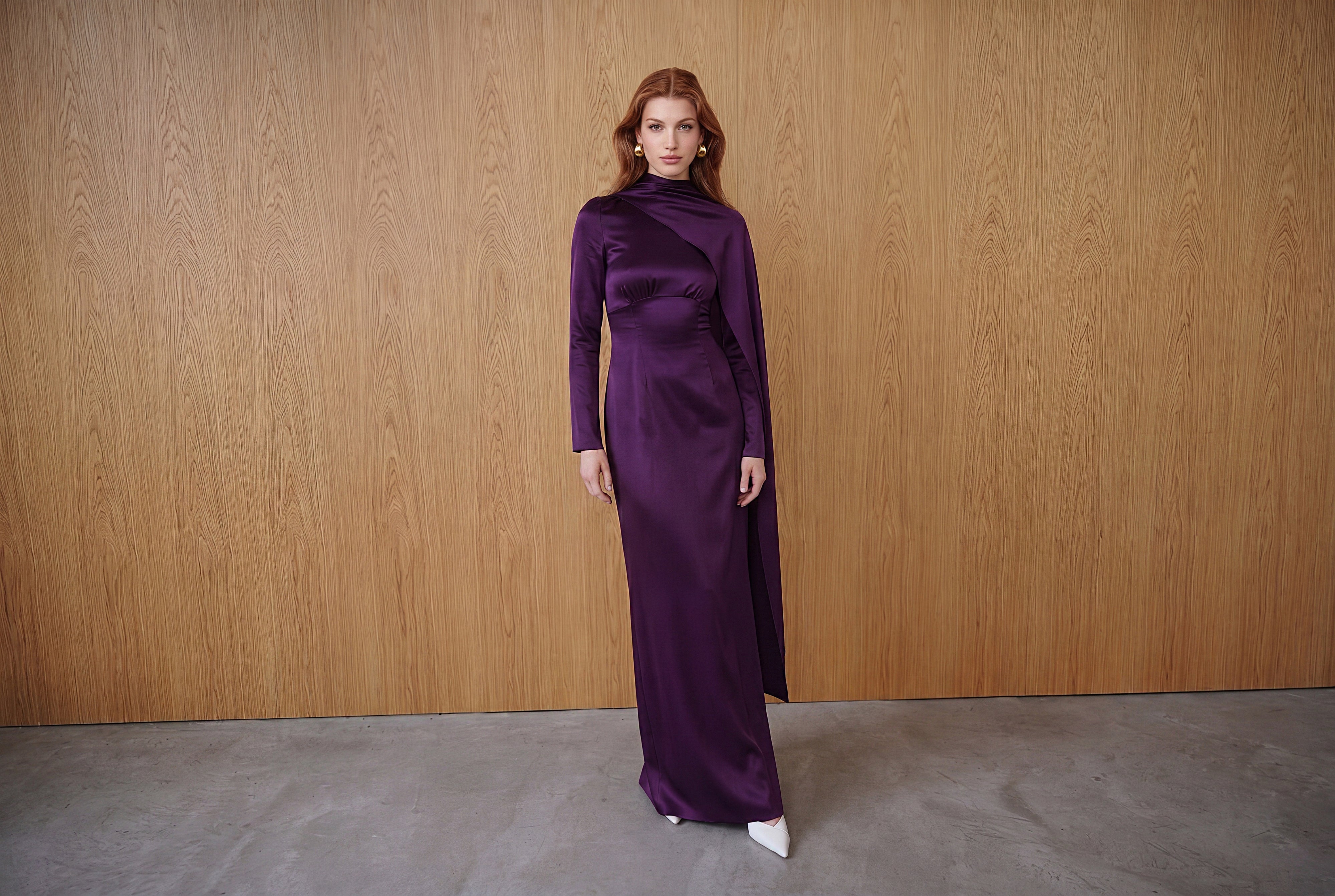 woman wearing a purple modest evening dress